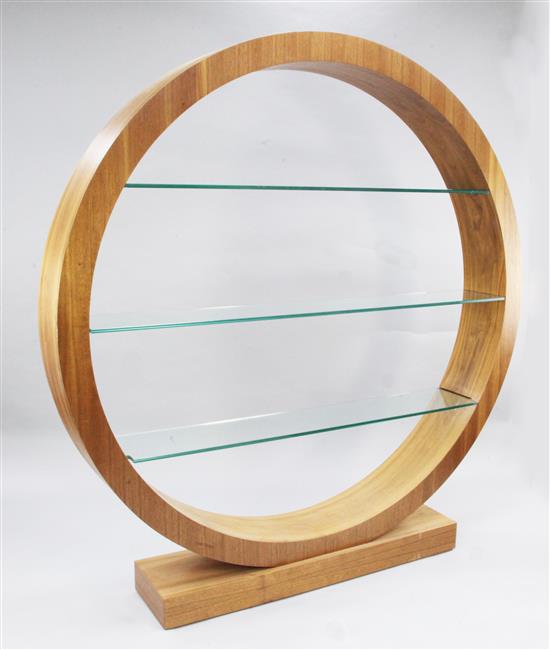 A large modern circular walnut open bookcase, H.6ft 2.5in. W.5ft 10in.